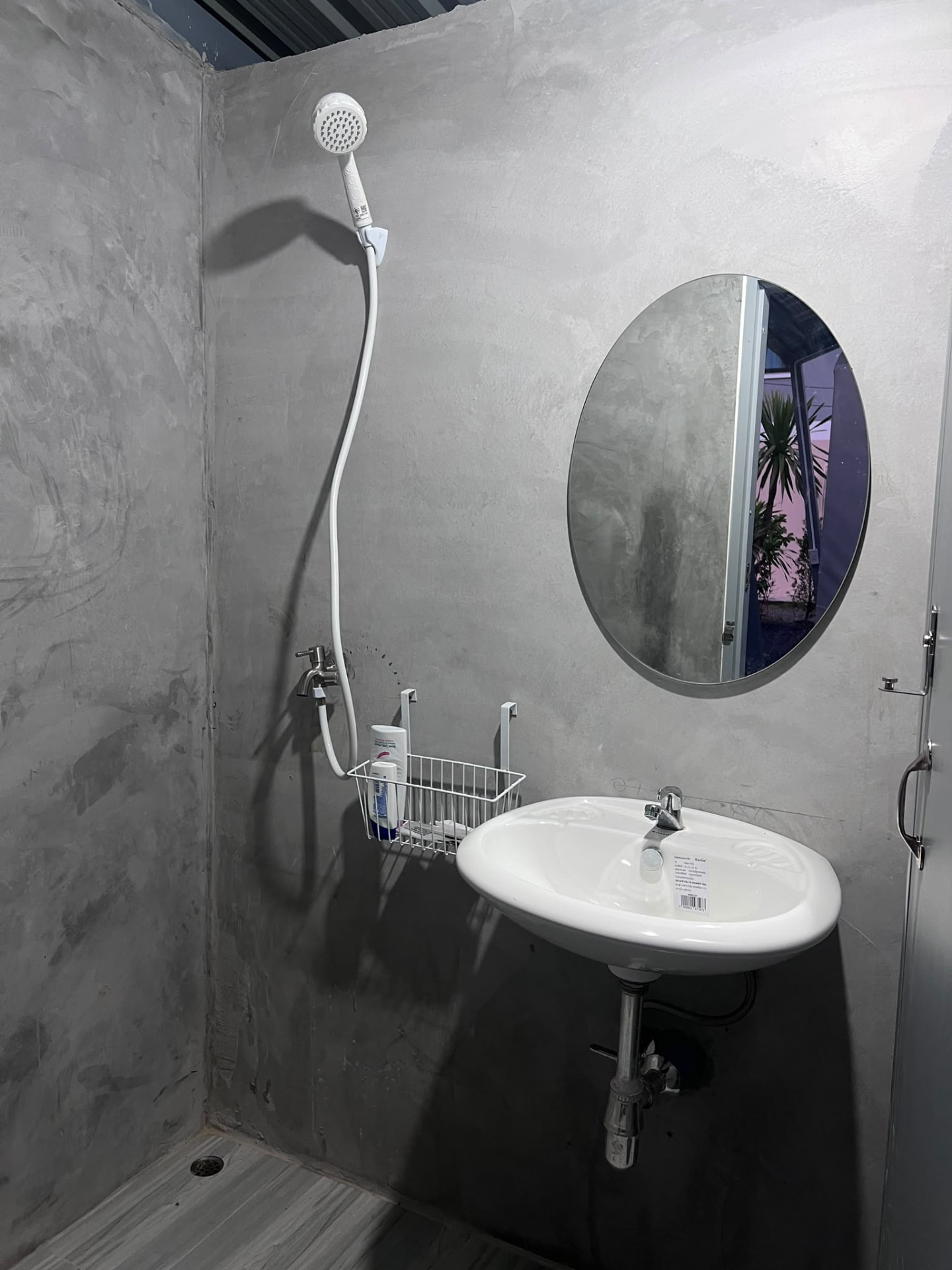 Shower and sink in the on-site bathroom at Wanasa